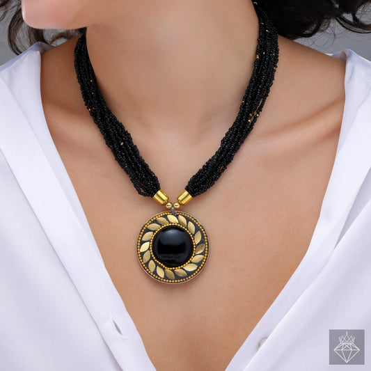AUROZI Antique Charm Pendant Necklace In Black Beads